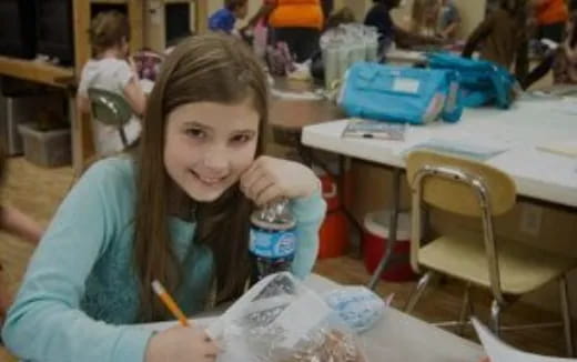 a young girl painting