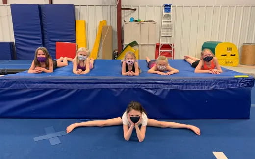 a group of people in a swimming pool