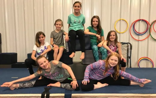 a group of people sitting on the floor