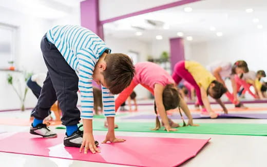 a group of people doing yoga