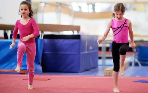 a couple of women exercising