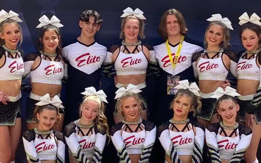 a group of women in matching outfits