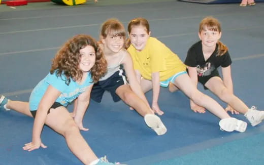 a group of people on a mat