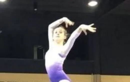 a man in a white dress