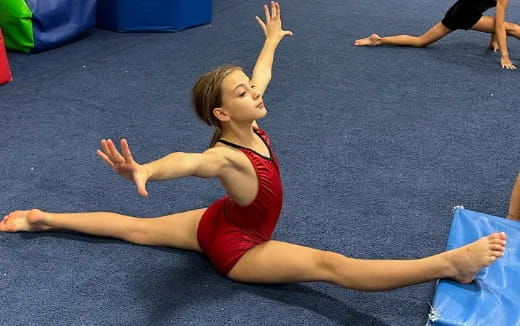 a girl doing a yoga pose