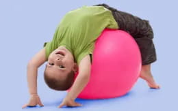 a child holding a balloon