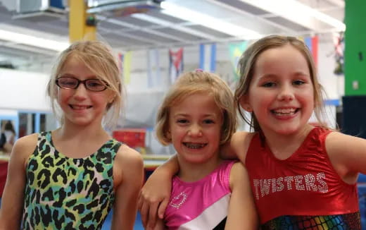 a group of girls smiling