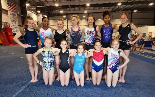 a group of women posing for a photo