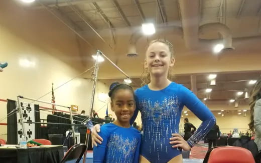 a person and a girl posing for a picture