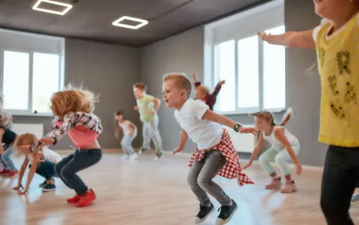 a group of children dancing