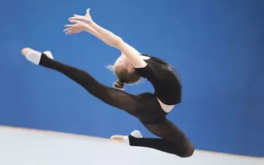 a person doing a handstand