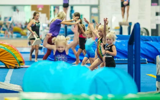 a group of children in a pool