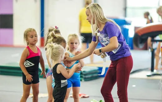 a group of girls in a gym