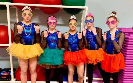 a group of women wearing clothing