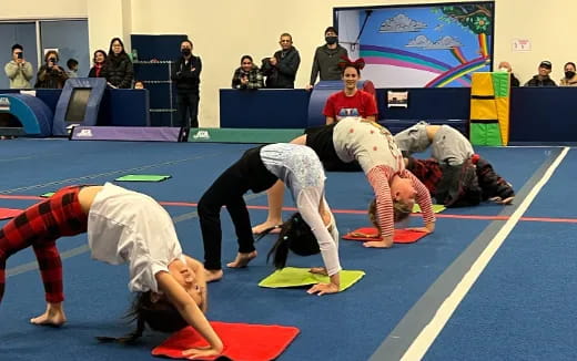 a group of people in a martial arts class