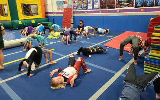 a group of people in a gym