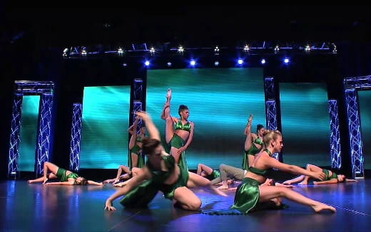 a group of people on a stage