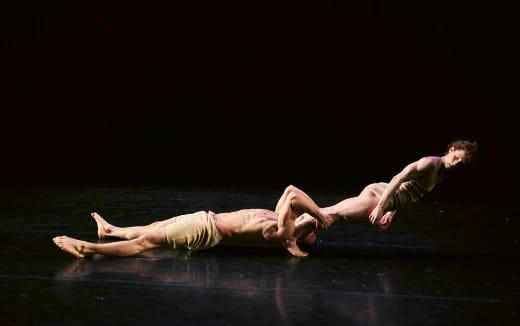 a man and a woman floating in water