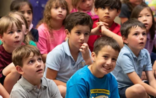 a group of children sitting together