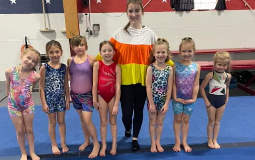 a group of children posing for a photo