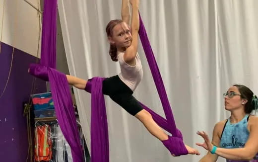 a person doing a handstand