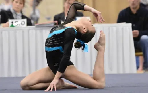 a person in a wrestling uniform