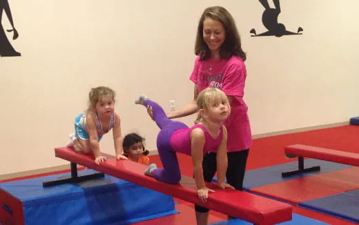 a group of children on a mat