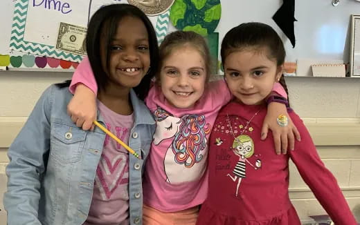 a group of girls smiling