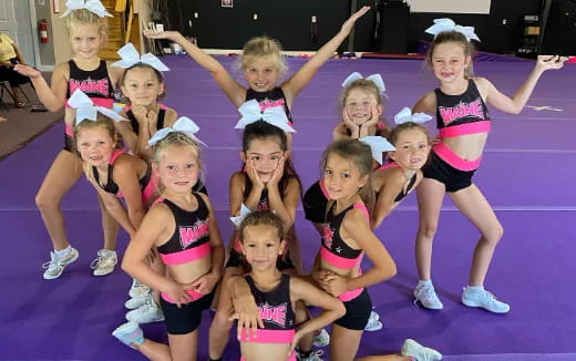 a group of girls posing for a photo