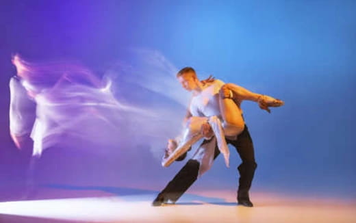 a man and woman dancing