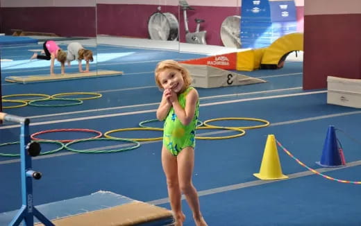 a girl in a green dress