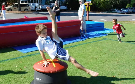 a boy playing with a toy