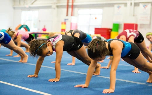 a group of women doing yoga