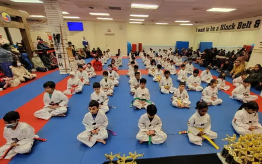 a group of people sitting in a circle