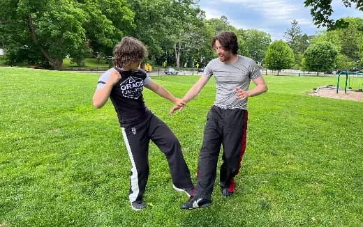 two people in a field