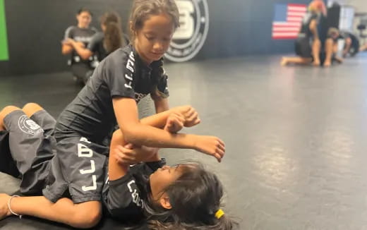 a group of people kneeling on the floor