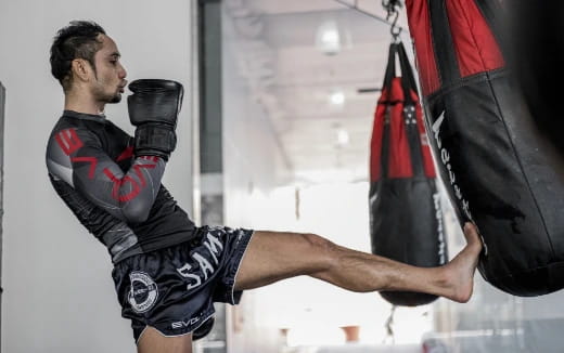 a person punching another man