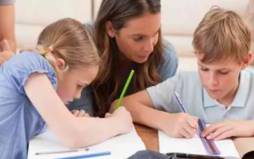 a group of children studying