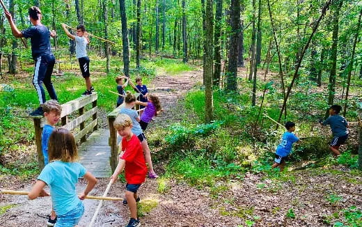a group of people in the woods