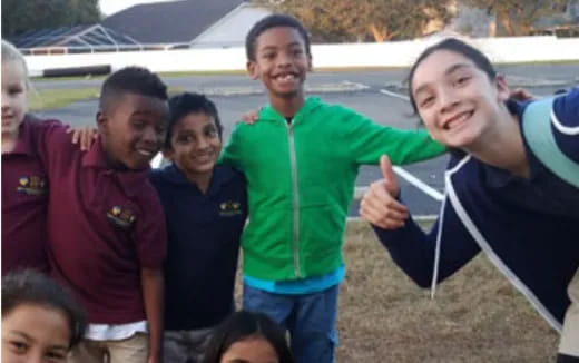 a group of people posing for a photo