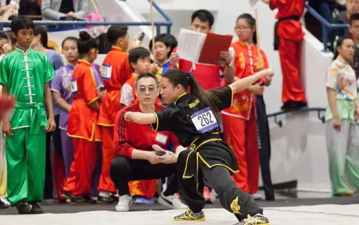 a group of people in a marching band