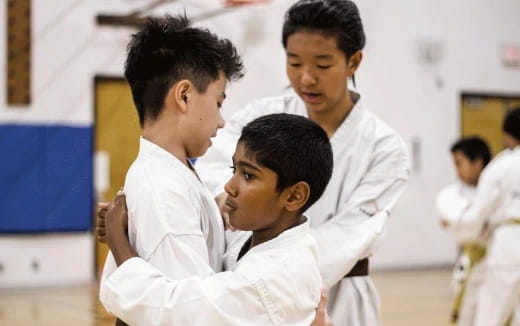 a group of people in white robes