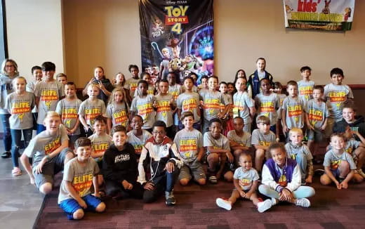 a group of children posing for a photo