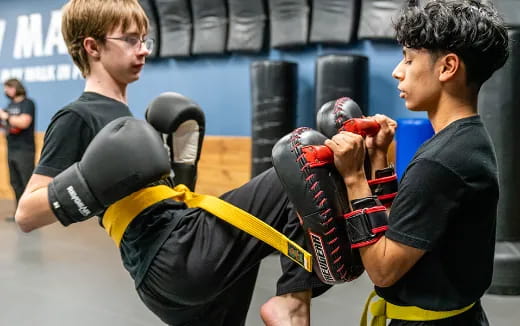 a couple of men in boxing gloves