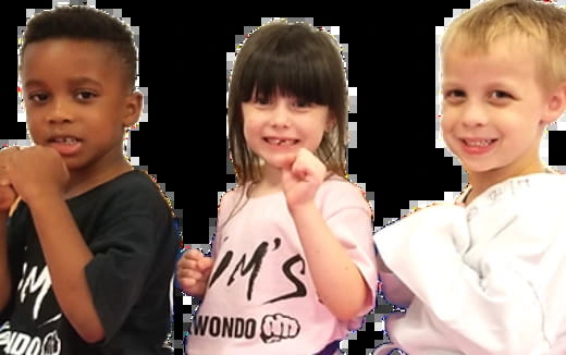 a group of children posing for the camera