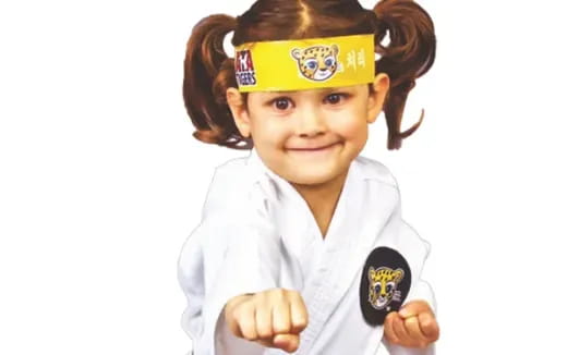 a young girl with a yellow hat