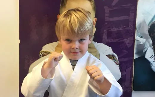 a child wearing a white shirt