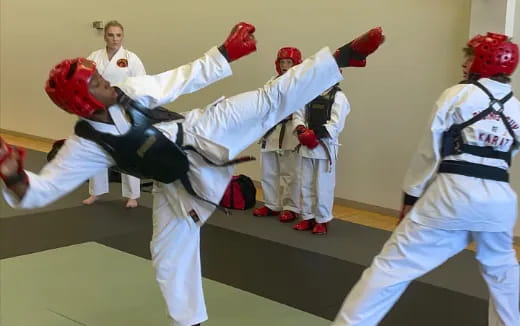 a group of people in white uniforms