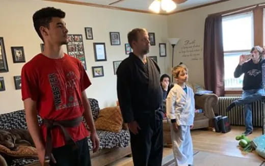 a group of people in a living room