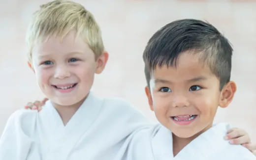 a couple of boys smiling